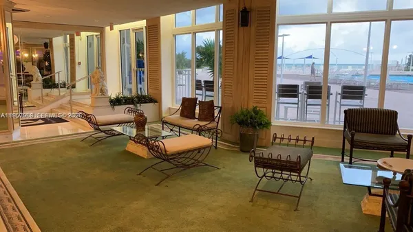 a view of a dining room with furniture