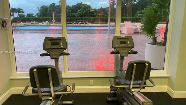 a view of a room with gym equipment