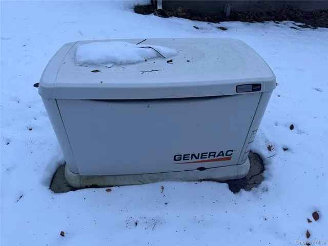 a view of a livingroom with kitchen space