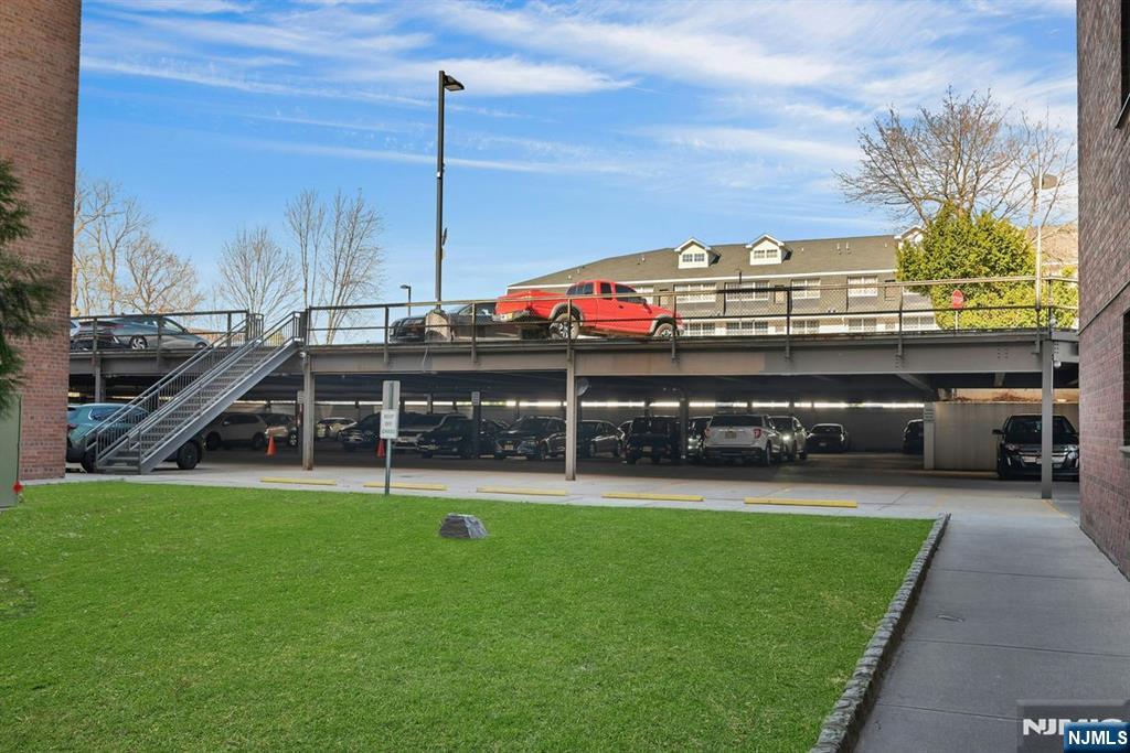 208 Anderson Street, Unit S5A Hackensack, NJ 07601 - Photo 17 of 17 a view of a garden with a slide