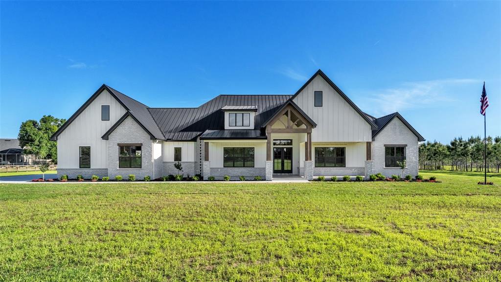 0 Dynamite Road Bartow, FL 33830 - Photo 1 of 1 a front view of house with yard and green space