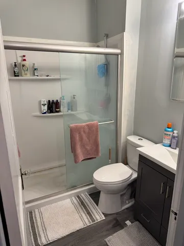 a bathroom with a toilet and a sink