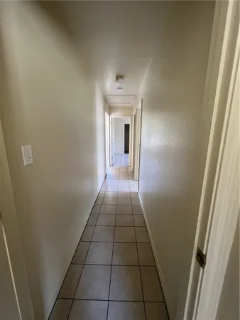a view of a hallway in a house