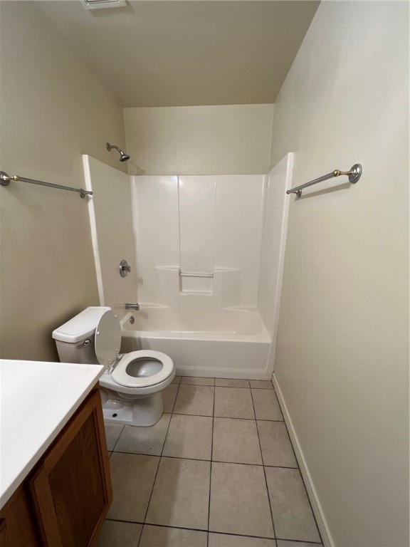 1409 Dewitt Street Corpus Christi, TX 78418 - Photo 7 of 9 a bathroom with a granite countertop sink toilet and shower