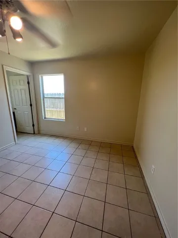 en empty room with windows