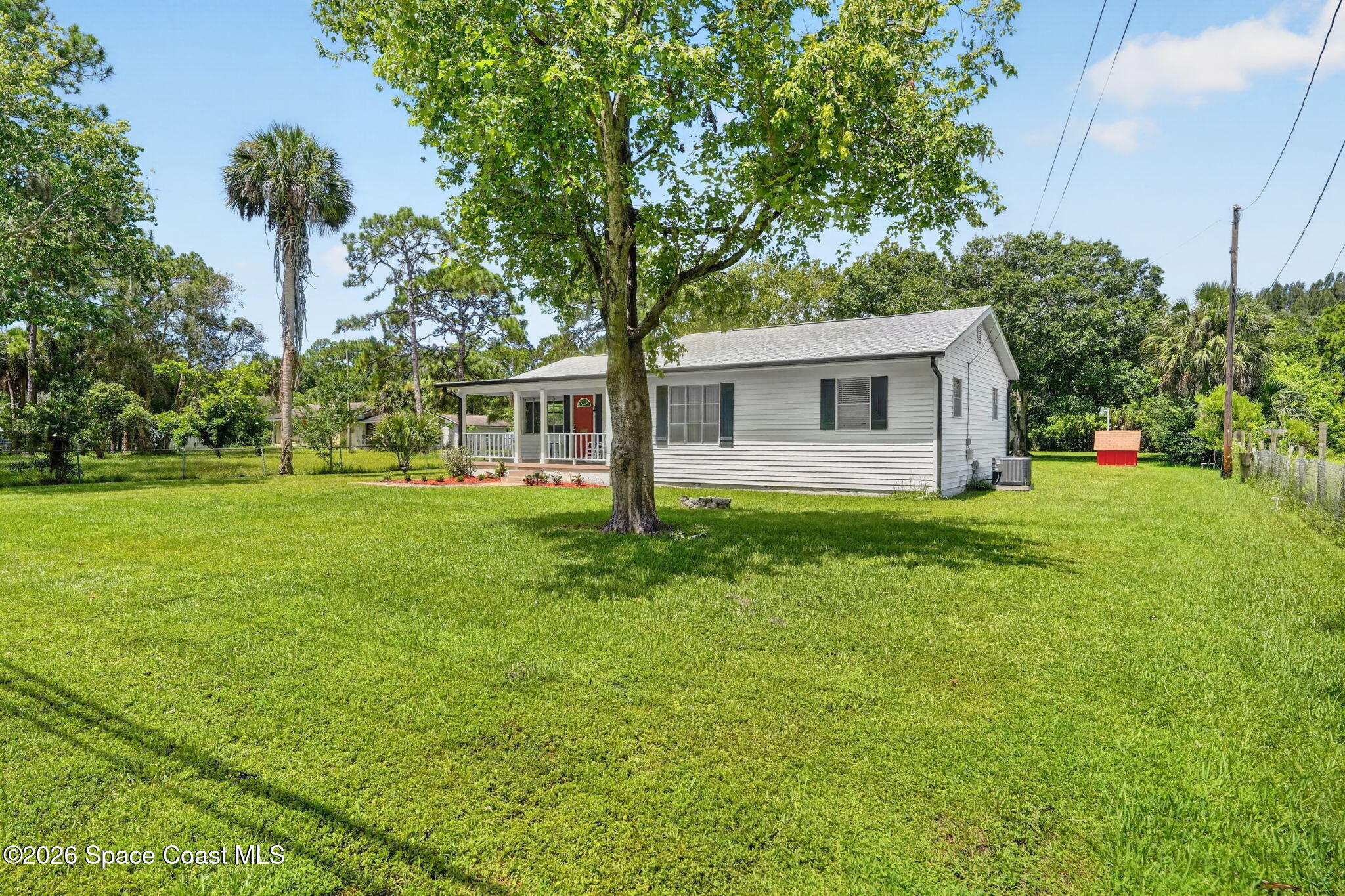 1944 Harlock Road Melbourne, FL 32934 - Photo 44 of 52 Front Of Home and Front Yard