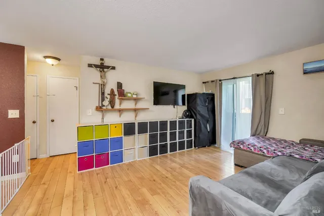a kitchen with a sink appliances and cabinets