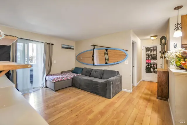 a kitchen that has a sink and a stove in it