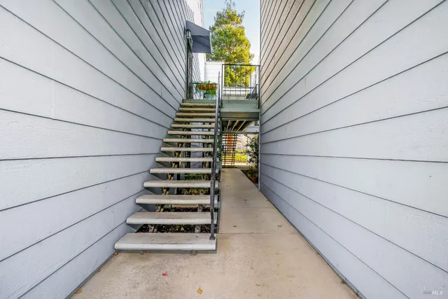 a bedroom with a bed and dresser