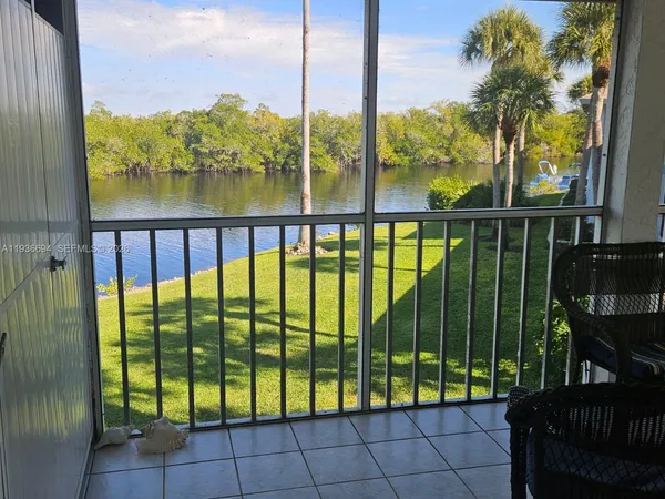 a view of swimming pool from a balcony