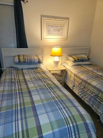 a view of a living room and bathroom