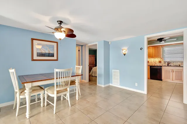 a view of a dining room kitchen and a window