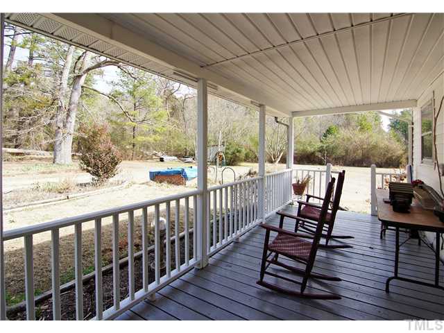 645 Center Grove Church Road Moncure, NC 27559 - Photo 21 of 25 This home has great porches and outdoor areas! This is the covered side porch.