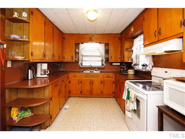 645 Center Grove Church Road Moncure, NC 27559 - Photo 4 of 25 Kitchen has lots of cabinets and counter space.