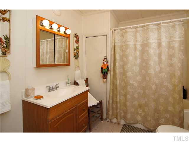 645 Center Grove Church Road Moncure, NC 27559 - Photo 8 of 25 The bathroom is on the first floor.
