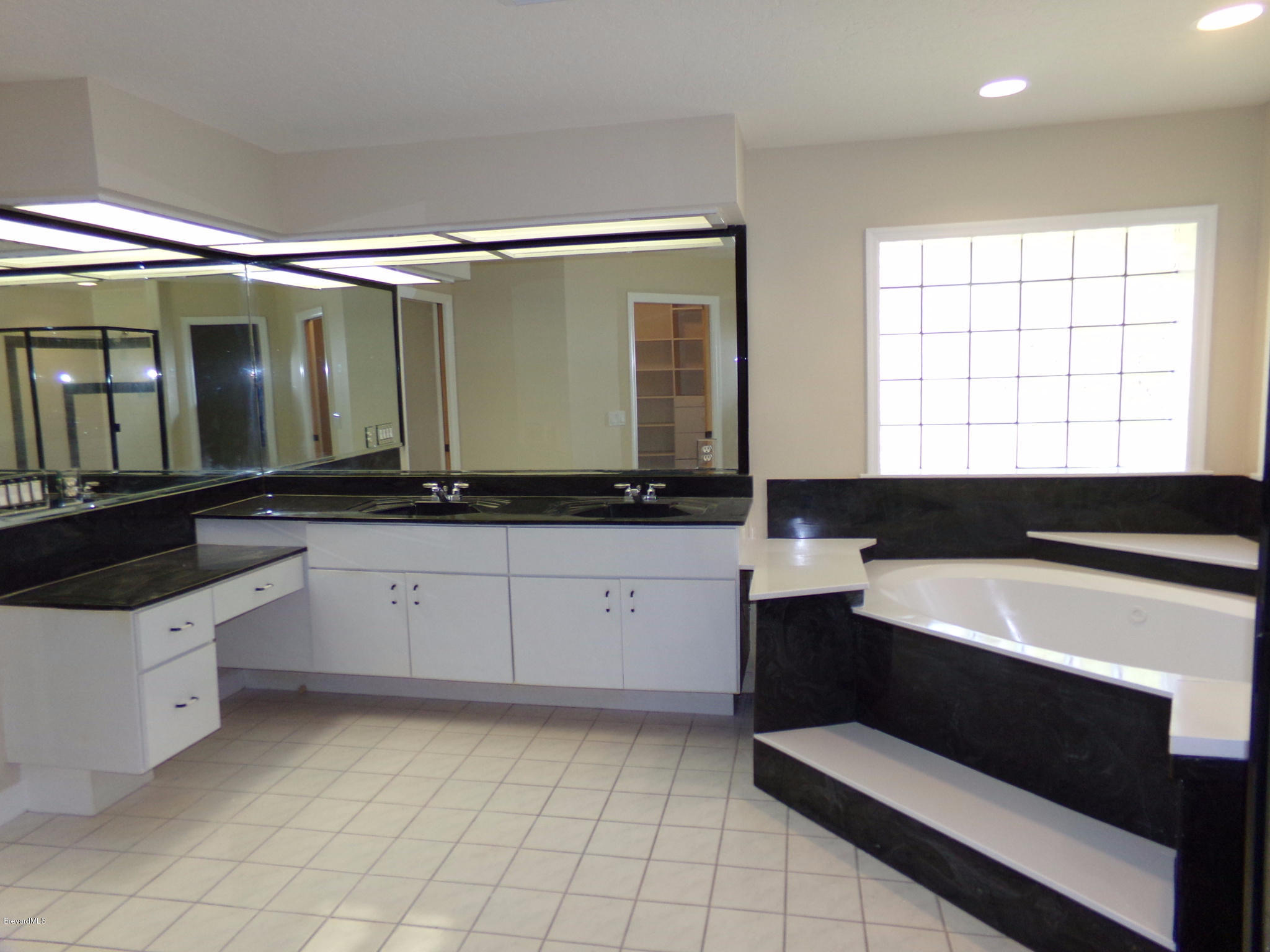 2527 Simon Road Melbourne, FL 32904 - Photo 11 of 27 Master bathroom alternate view