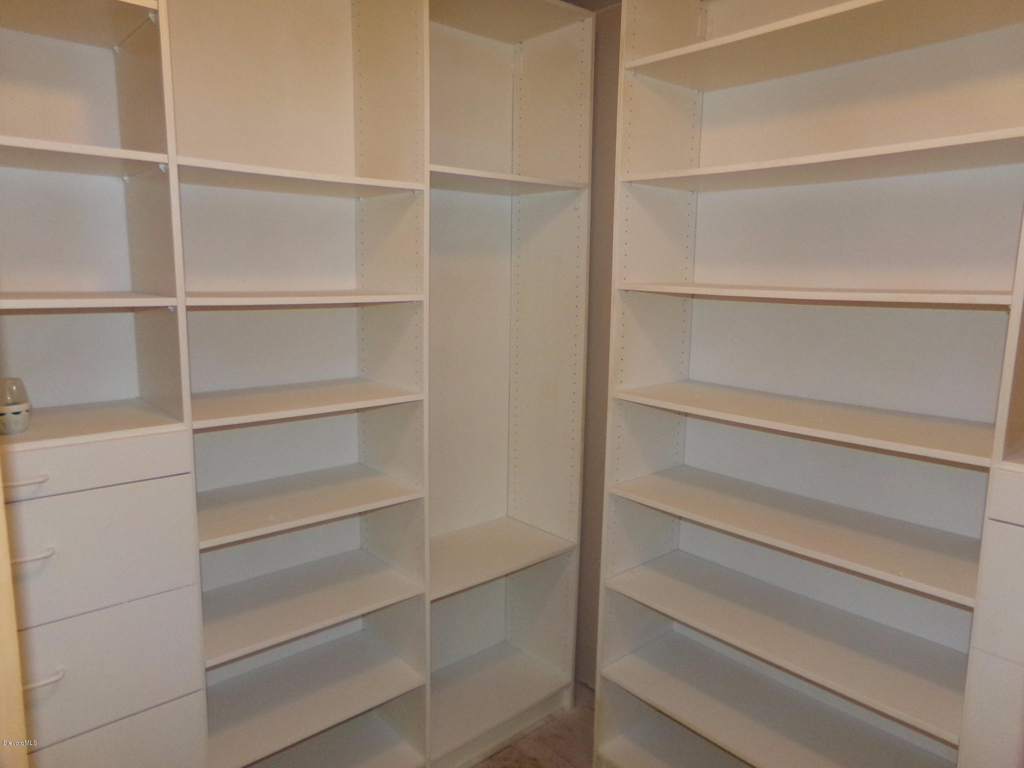 2527 Simon Road Melbourne, FL 32904 - Photo 12 of 27 Master bathroom walk-in closet