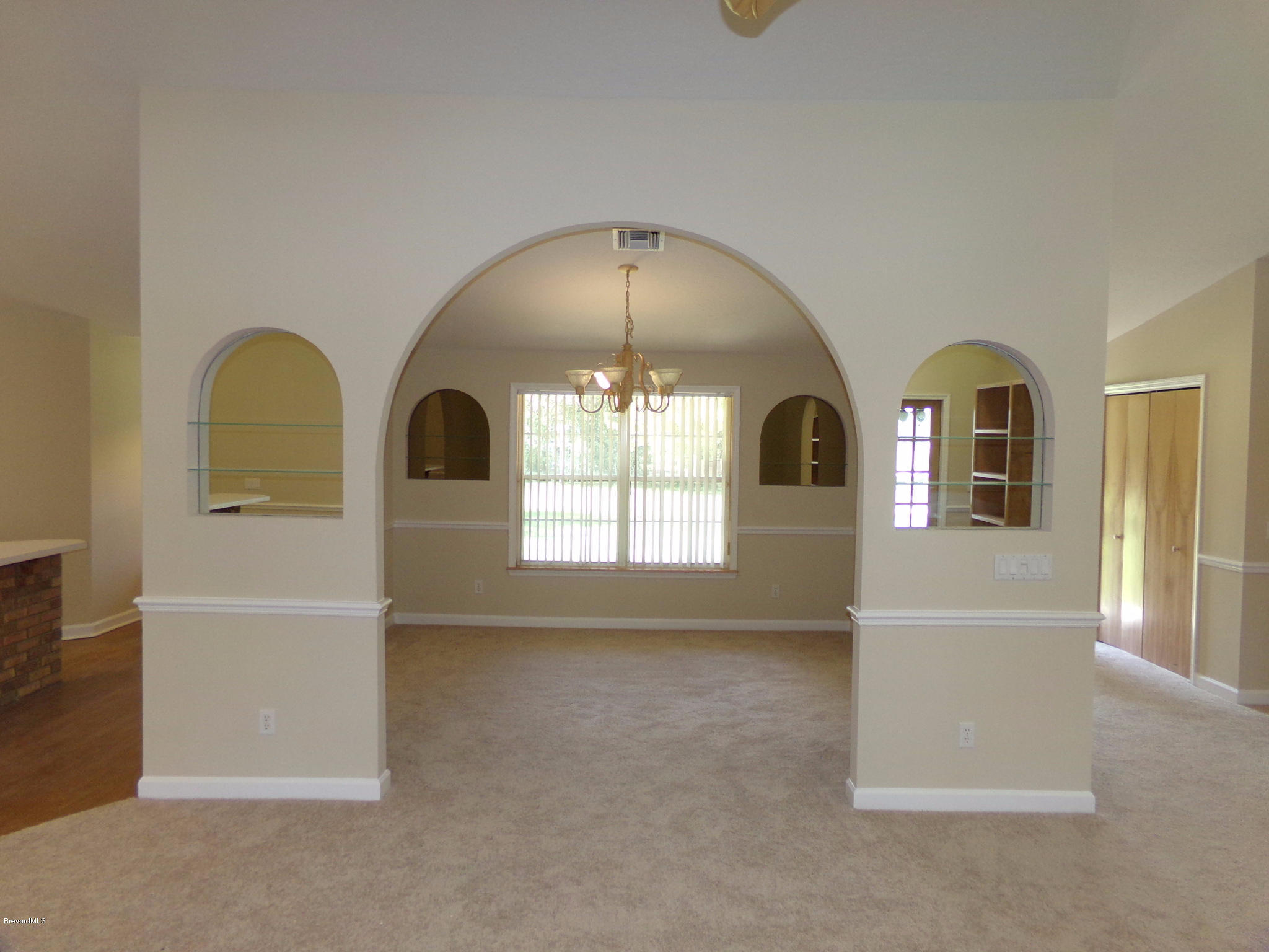 2527 Simon Road Melbourne, FL 32904 - Photo 18 of 27 Dining area from great room