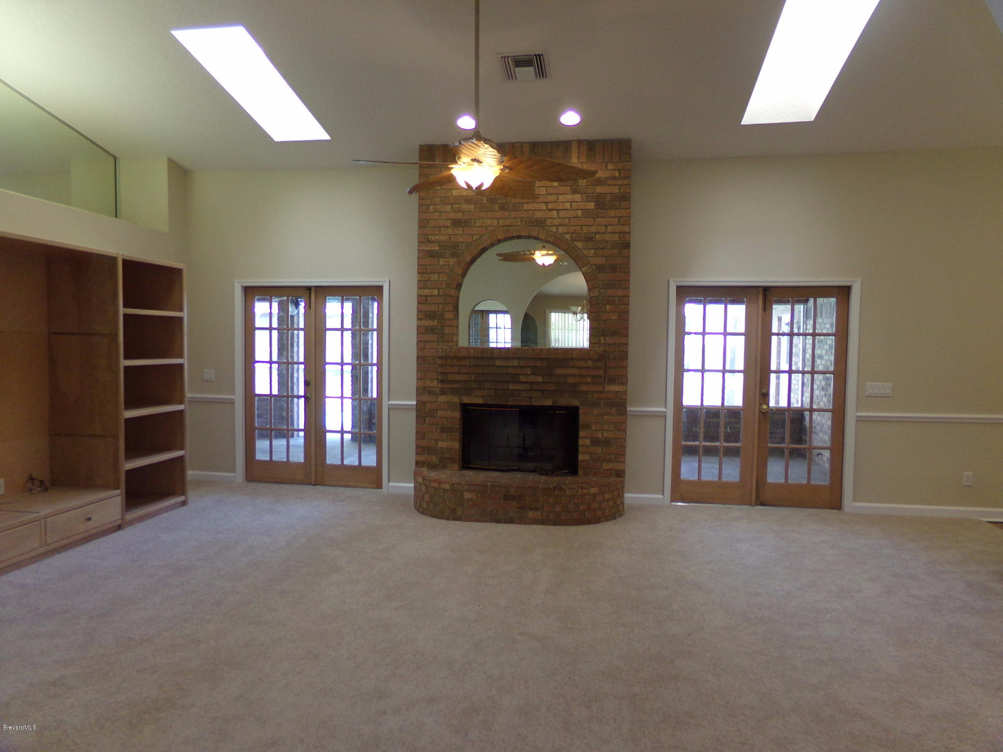 2527 Simon Road Melbourne, FL 32904 - Photo 19 of 27 Great room alternate view