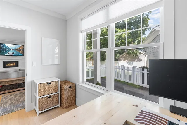 a kitchen with a refrigerator and a stove