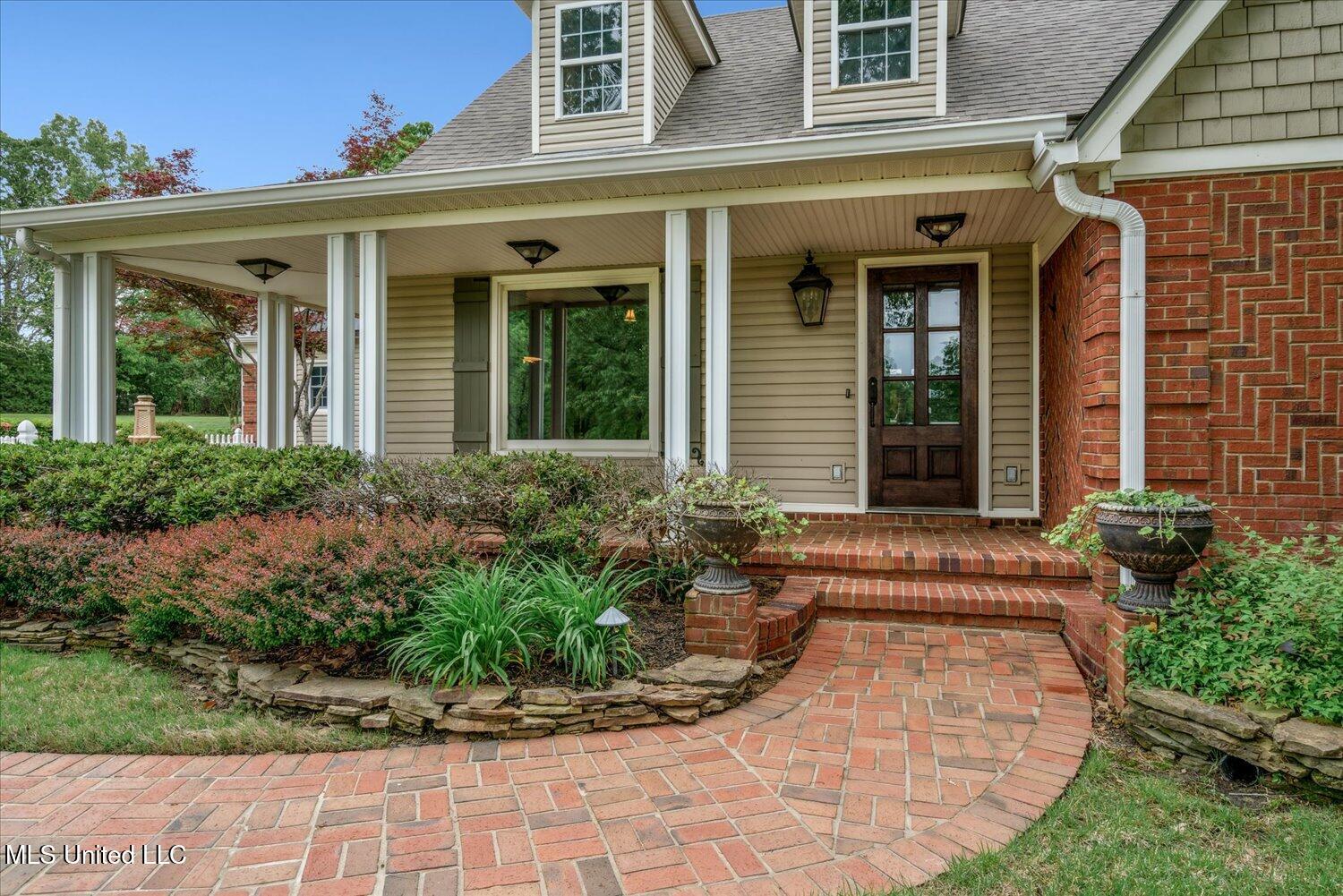 7300 Davidson Road Olive Branch, MS 38654 - Photo 8 of 55 Covered Wraparound Porch