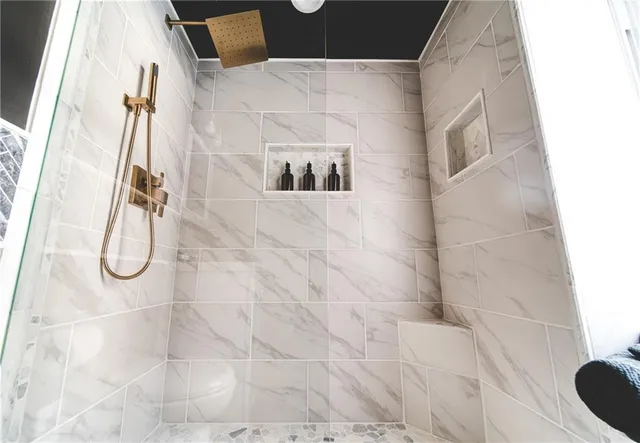 a kitchen with stainless steel appliances a refrigerator and a stove