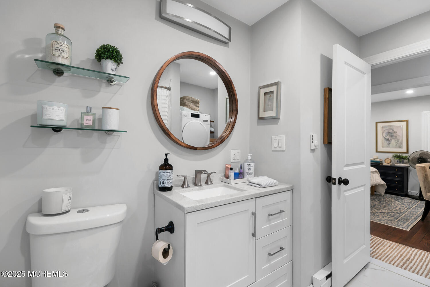 303 Hillside Avenue Atlantic Highlands, NJ 07716 - Photo 16 of 103 a bathroom with a toilet sink and mirror