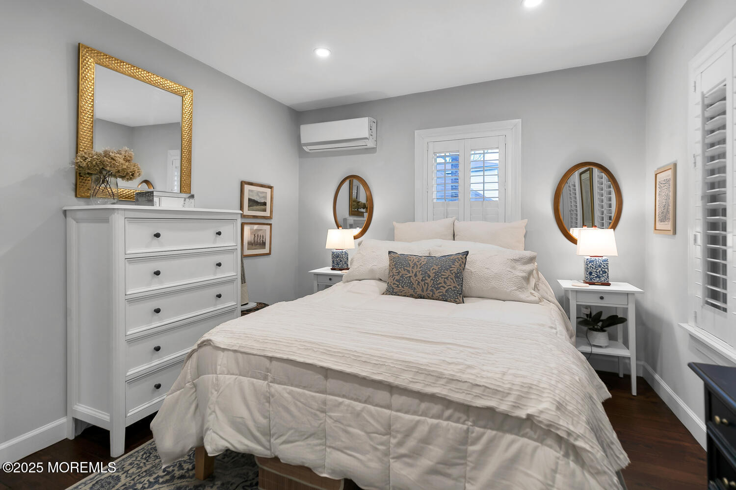 303 Hillside Avenue Atlantic Highlands, NJ 07716 - Photo 51 of 103 a bedroom with a bed and a painting on the wall