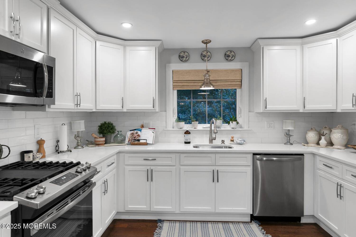303 Hillside Avenue Atlantic Highlands, NJ 07716 - Photo 7 of 103 a kitchen with stainless steel appliances a sink a stove and cabinets