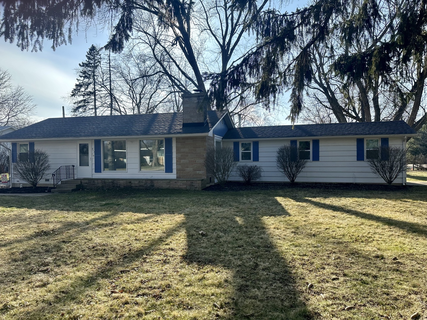 a view of a house with a large pool