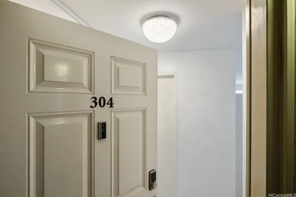 a view of a hallway with closet