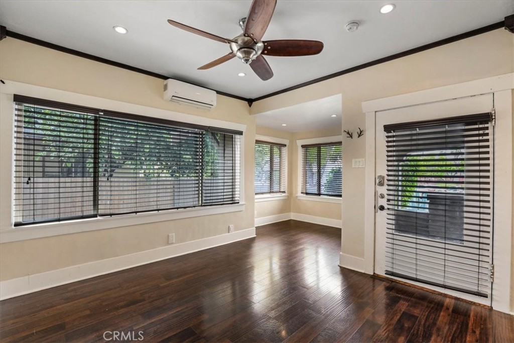 1352 Elm Avenue Long Beach, CA 90813 - Photo 14 of 71 a view of livingroom with hardwood floor and a ceiling fan