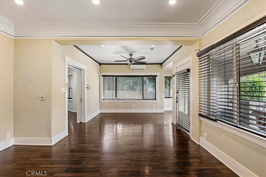 1352 Elm Avenue Long Beach, CA 90813 - Photo 16 of 71 a view of empty room with wooden floor and fan