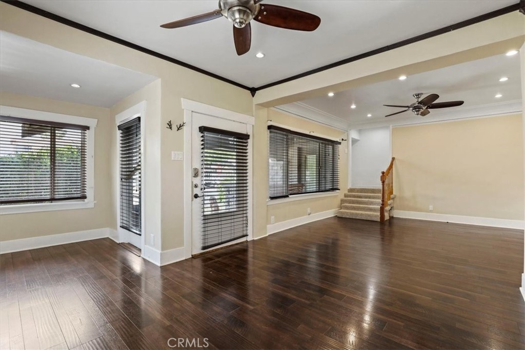 1352 Elm Avenue Long Beach, CA 90813 - Photo 17 of 71 a view of an empty room with a window and wooden floor