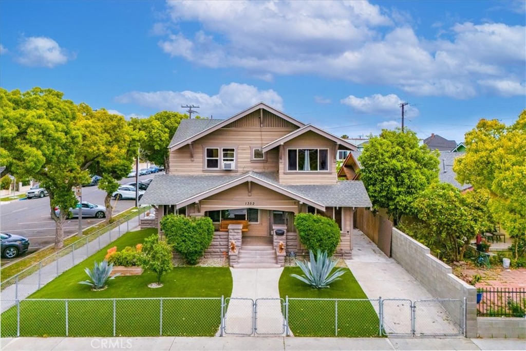 1352 Elm Avenue Long Beach, CA 90813 - Photo 2 of 71 a house with green field in front of it