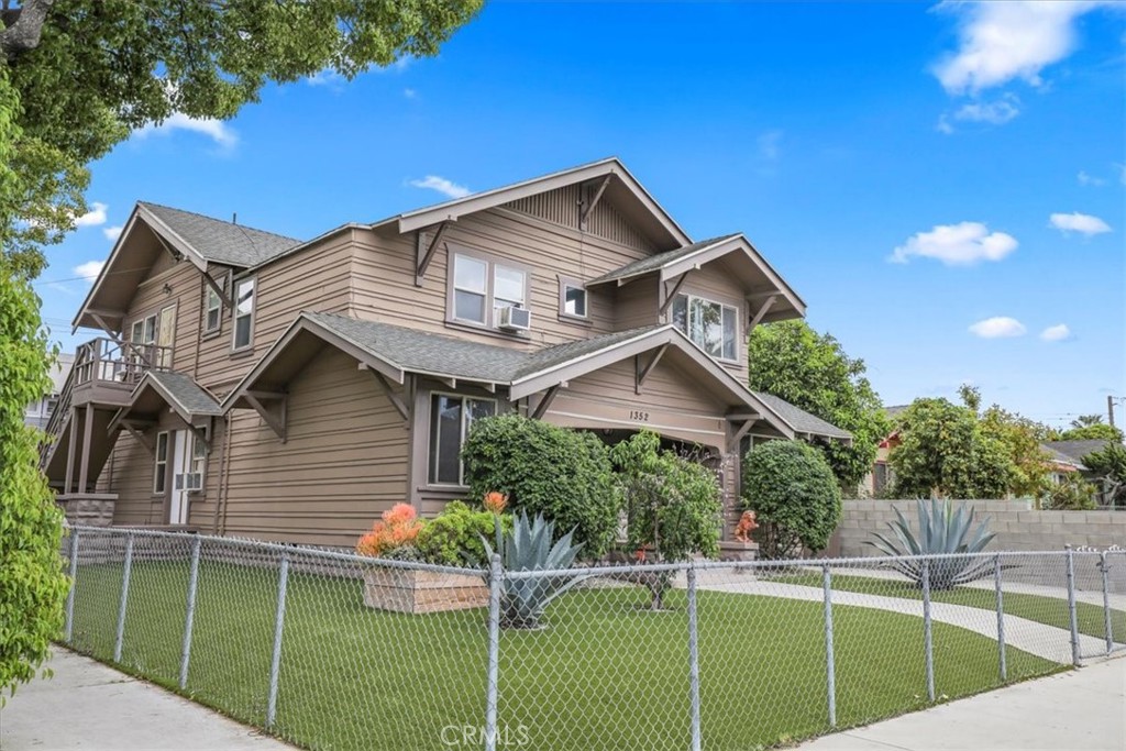 1352 Elm Avenue Long Beach, CA 90813 - Photo 3 of 71 a view of a house with a yard and potted plants