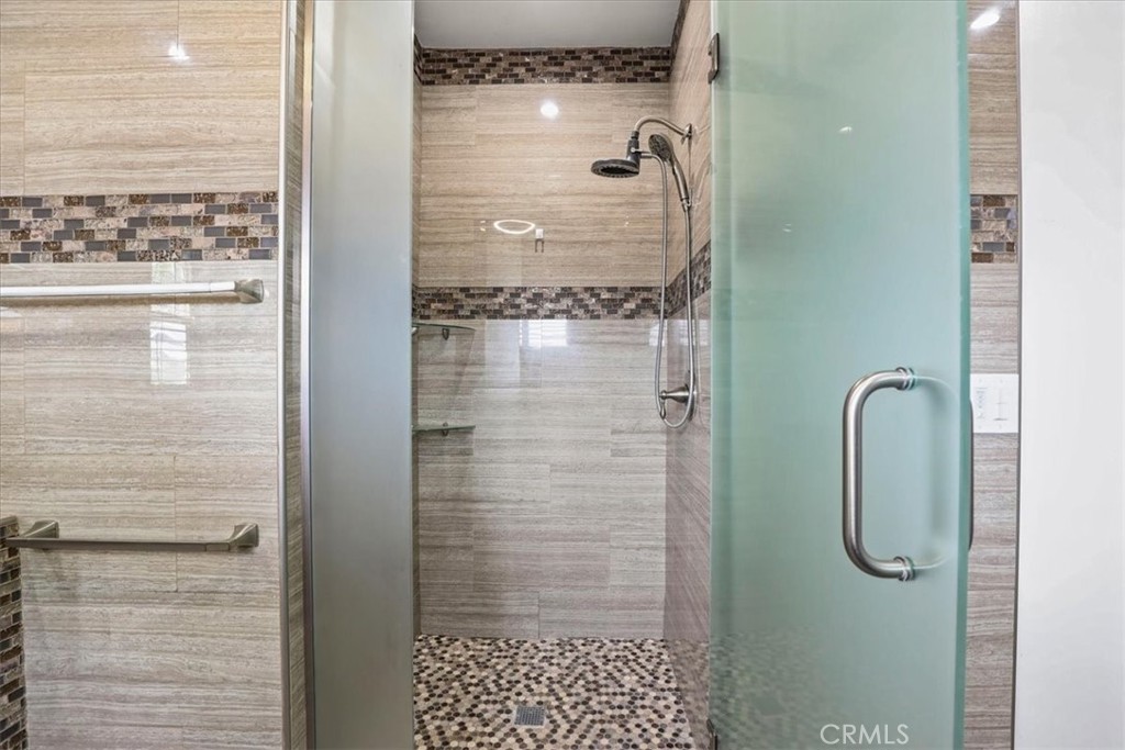 1352 Elm Avenue Long Beach, CA 90813 - Photo 33 of 71 a bathroom with a glass shower door