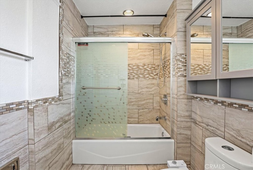 1352 Elm Avenue Long Beach, CA 90813 - Photo 56 of 71 a bathroom with a shower and a sink