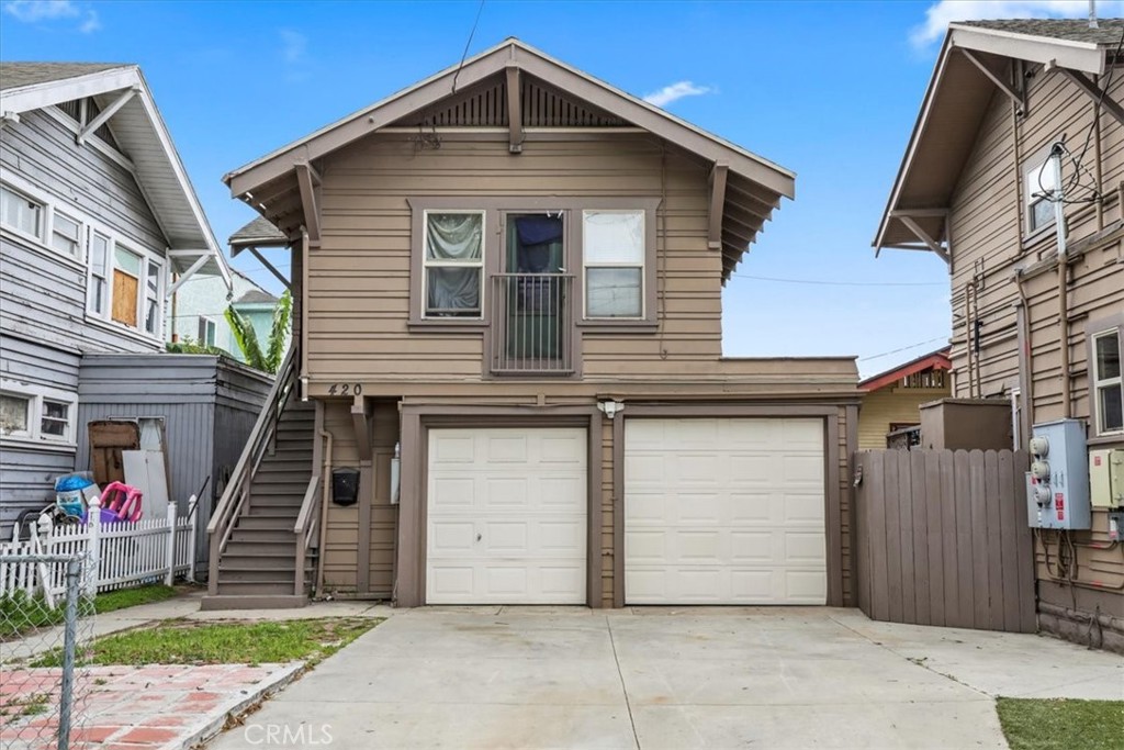 1352 Elm Avenue Long Beach, CA 90813 - Photo 62 of 71 a front view of a house with a garage