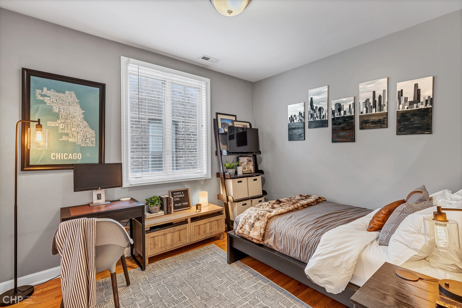 1645 West Addison Street, Unit 2 Chicago, IL 60613 - Photo 13 of 19 a bedroom with bed and a window