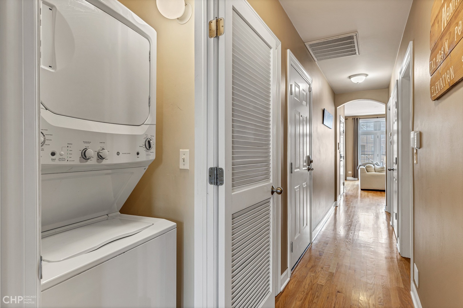1645 West Addison Street, Unit 2 Chicago, IL 60613 - Photo 16 of 19 a view of hallway with wooden floor