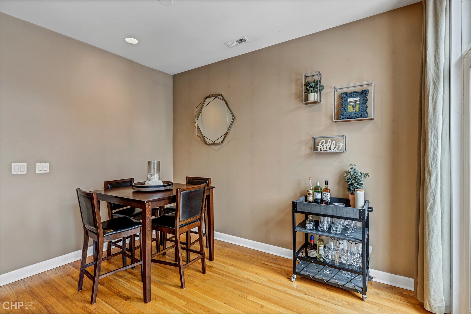 1645 West Addison Street, Unit 2 Chicago, IL 60613 - Photo 6 of 19 a view of a livingroom with furniture and wooden floor