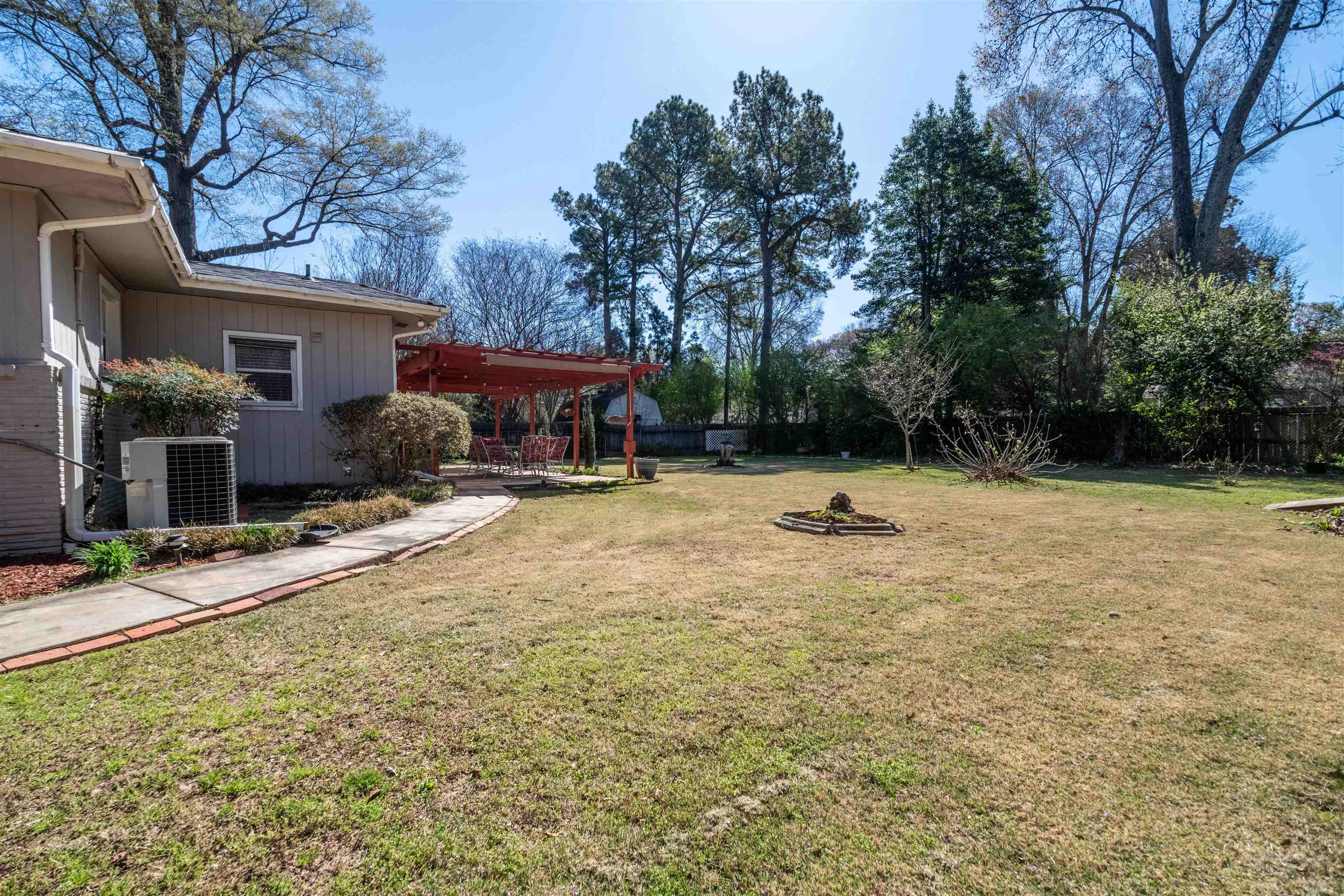 5099 Walnut Grove Road Memphis, TN 38117 - Photo 21 of 24 Fenced backyard featuring a deck
