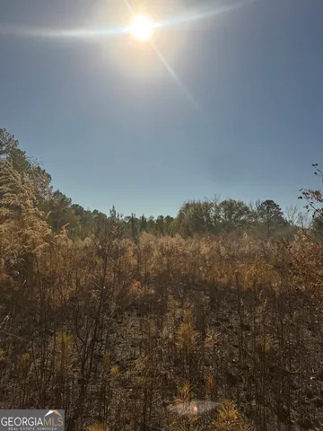 a view of a houses with a mountain