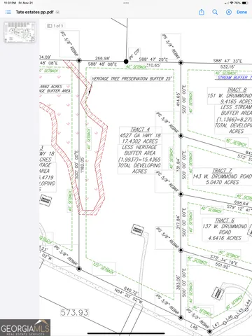 a picture of a bathroom with a shower
