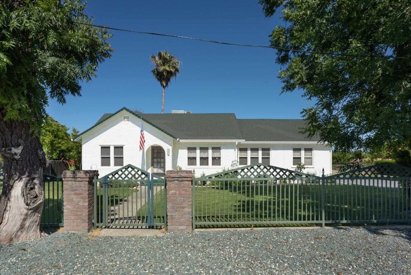 1331 Mawson Road Meridian, CA 95957 - Photo 1 of 1 a front view of a house with a garden