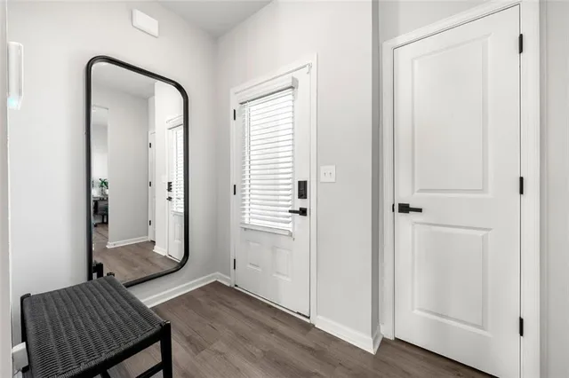 an entryway at a bedroom and windows