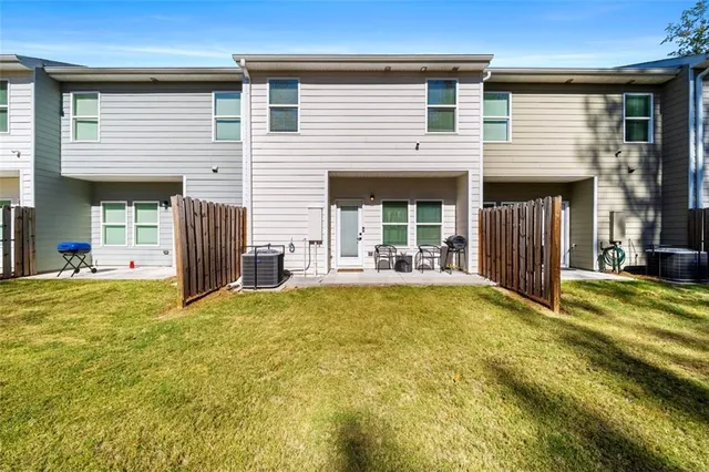 a view of a house with a swimming pool