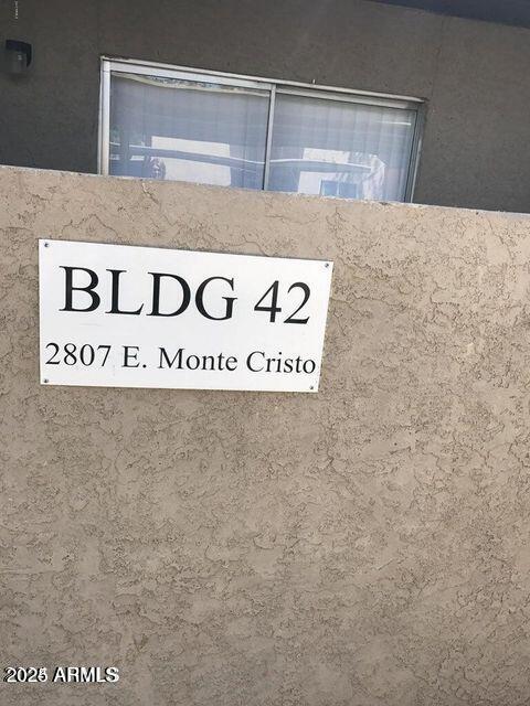 2807 East Monte Cristo Avenue, Unit 102 Phoenix, AZ 85032 - Photo 1 of 1 a close up of a street sign