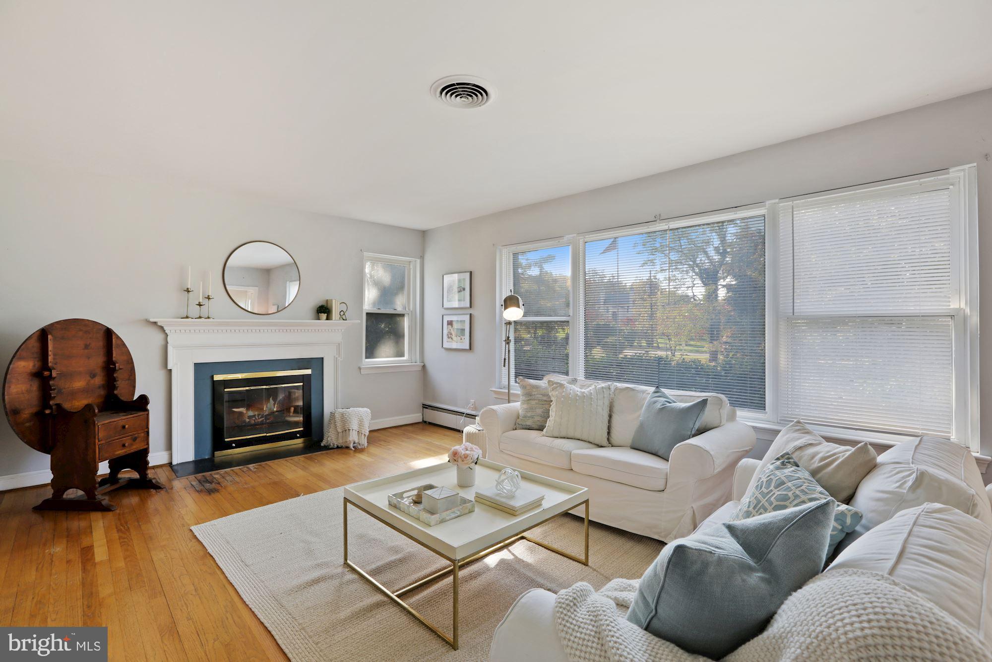 10809 South Glen Road Potomac, MD 20854 - Photo 2 of 27 Living Room with Fireplace